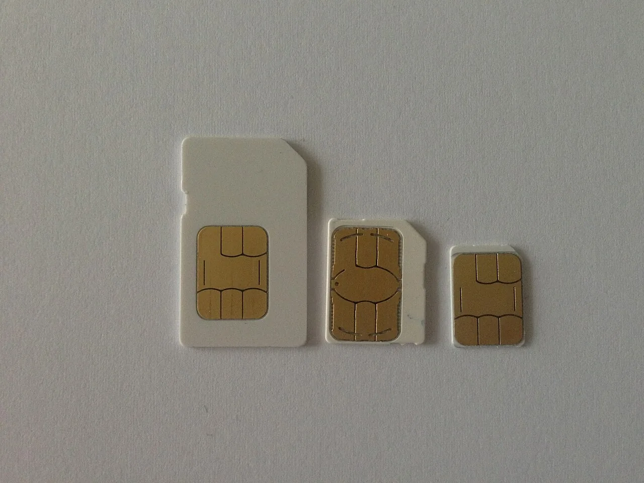 Mini, micro and nano SIM cards showing their different sizes.
