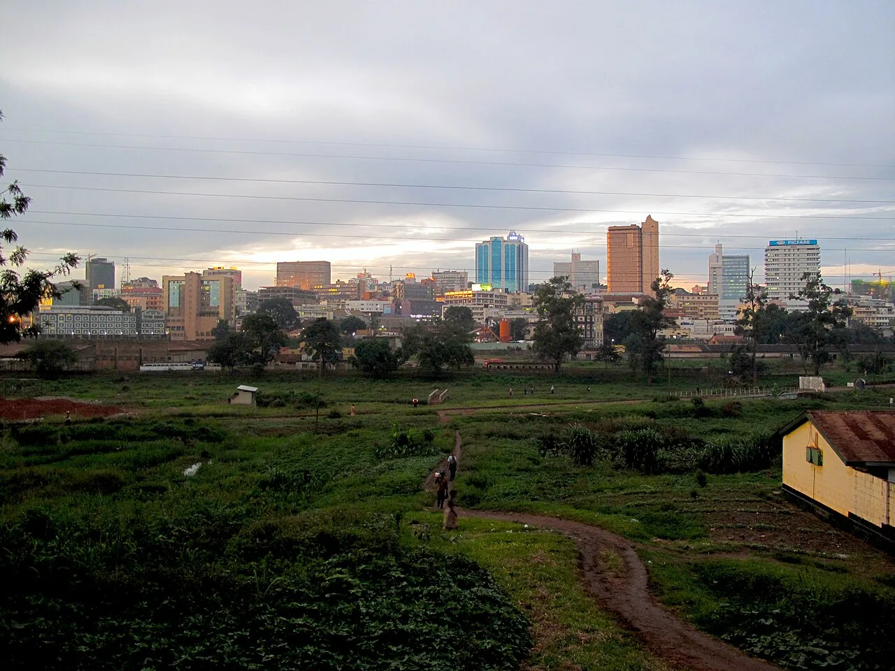 Kampala skyline beyond a railway yard, Uganda.